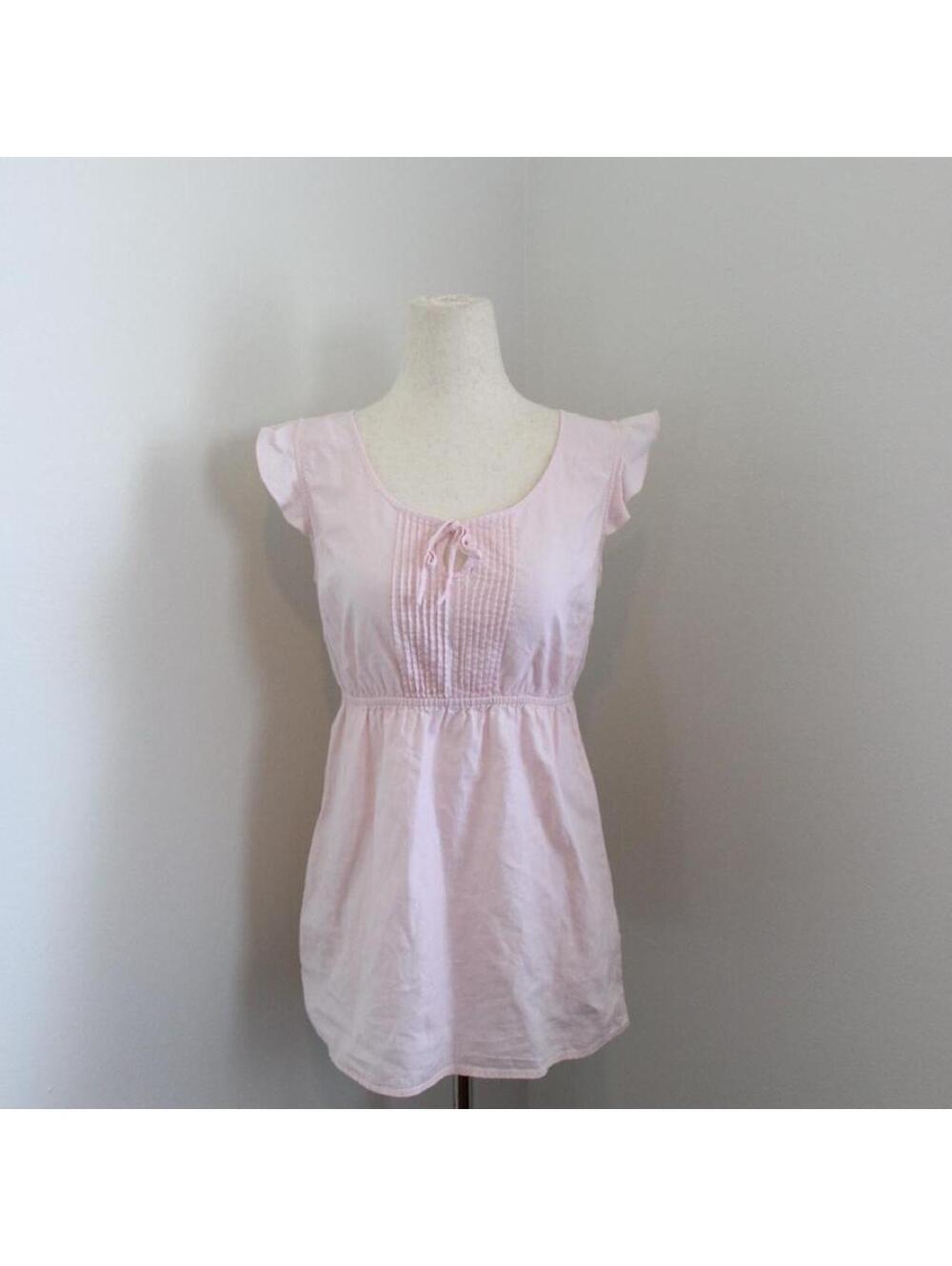 Y2K Pink babydoll top with ruffle sleeves and tie detail. Size small.
